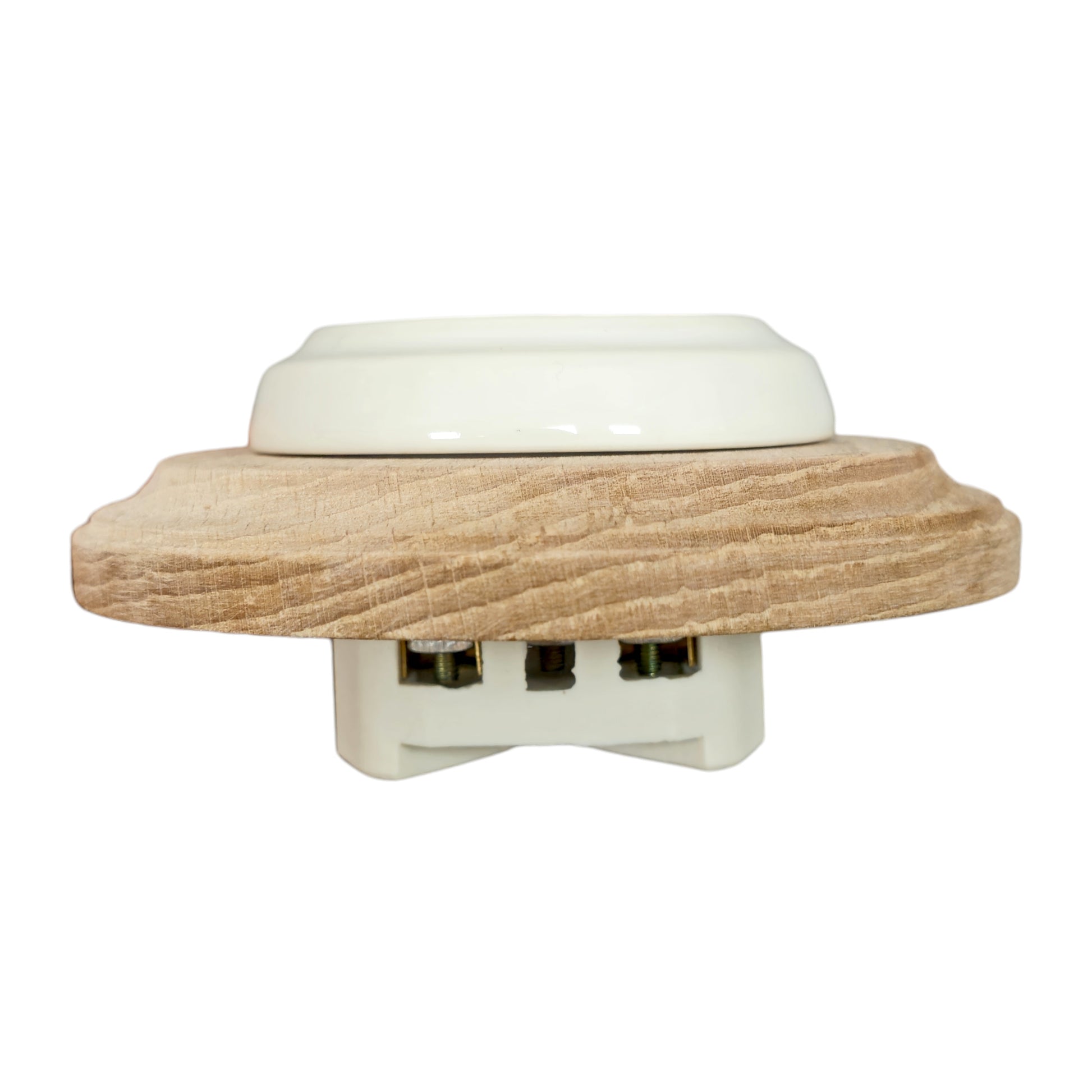 Single SCHUKO porcelain socket with wooden frame, white, flush-mounted, angled view