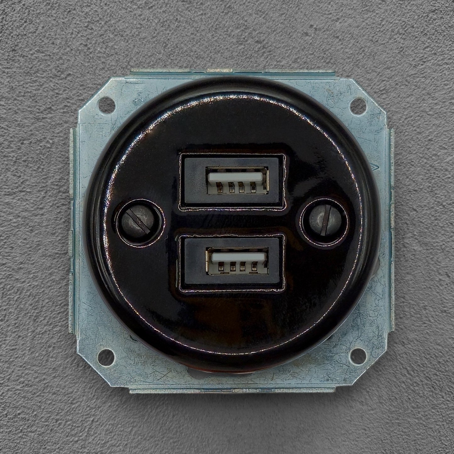 Black porcelain USB-A charging socket insert, flush-mounted, front
