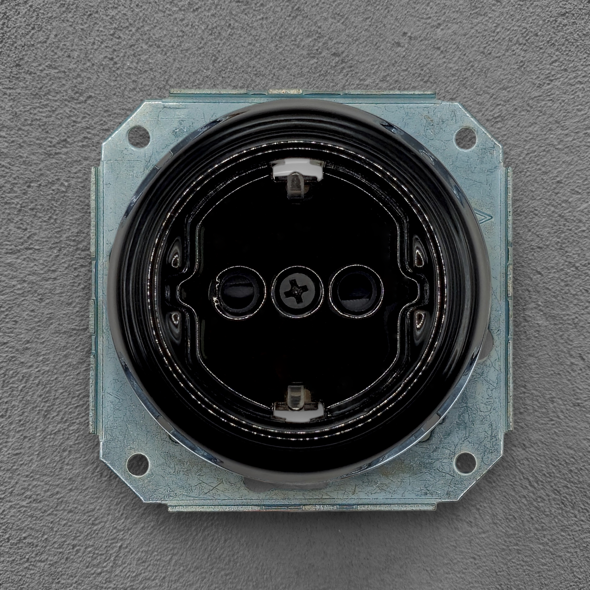 vintage black porcelain Schuko power socket insert flush-mounted