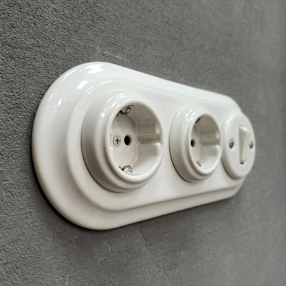 Double SCHUKO porcelain socket with light switch, white, flush-mounted, side view