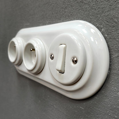 Double white French porcelain socket with light switch, flush-mount, angle