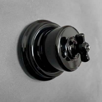 black porcelain double1way rotary light switch, surface-mount, angled