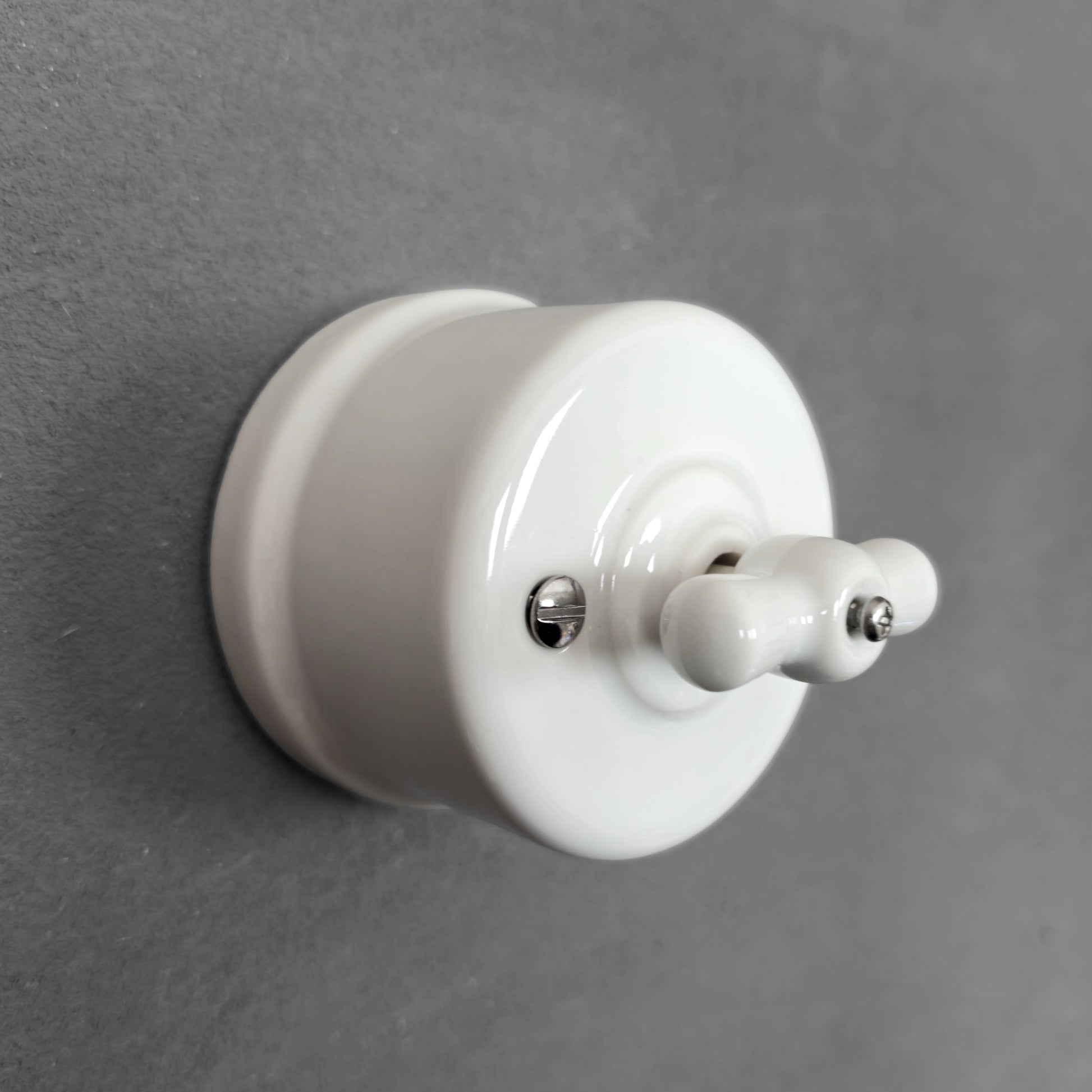 white porcelain double1way rotary switch insert, surface-mount, angled