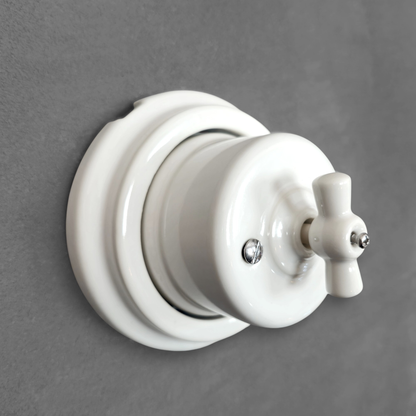 white porcelain double1way rotary light switch, surface-mount, angled