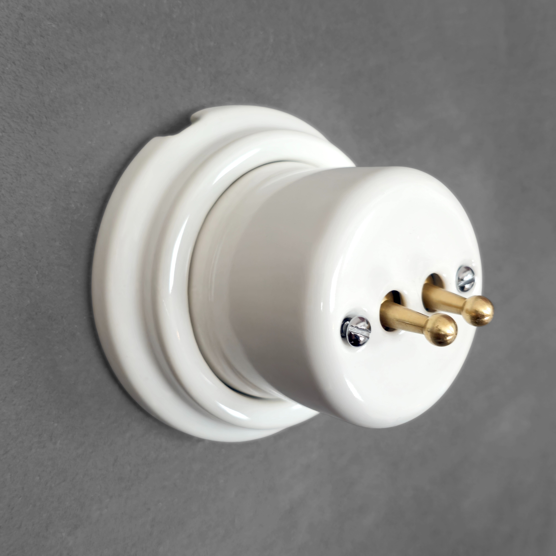white porcelain 2gang2way toggle light switch, surface-mount, angled