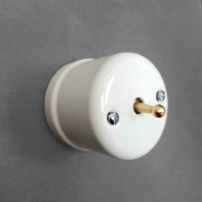 white porcelain 1gang2way toggle switch insert, surface-mount, angled