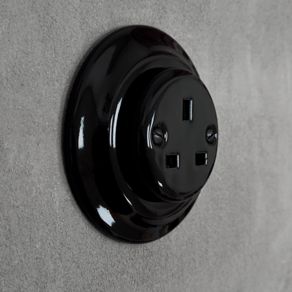 Black porcelain UK Plug Socket, flush-mounted, side
