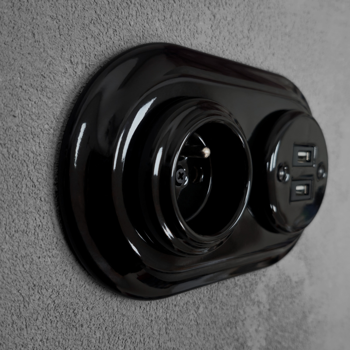 Black porcelain Type F socket with 2xUSB-A, flush-mount, side