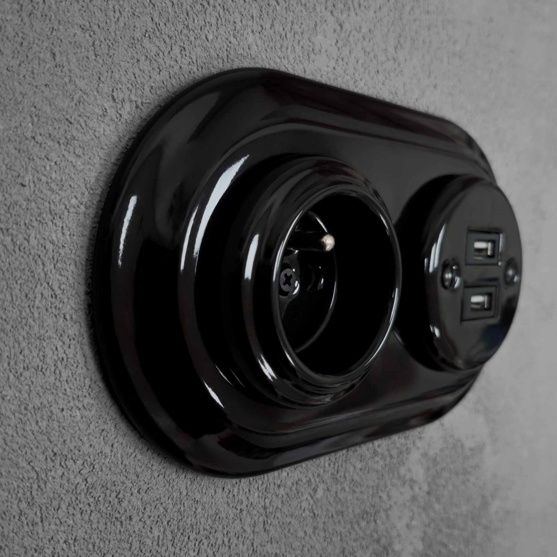 Black porcelain Type F socket with 2xUSB-A, flush-mount, side