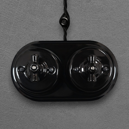 double black porcelain 1gang2way rotary switch, surface-mount, front