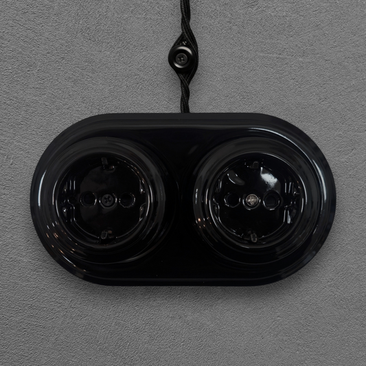 vintage double black porcelain Schuko power socket surface-mounted