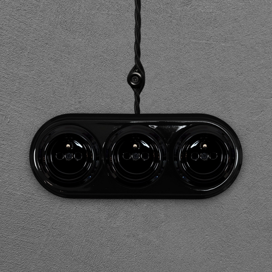 Triple black French porcelain socket, surface-mount, front