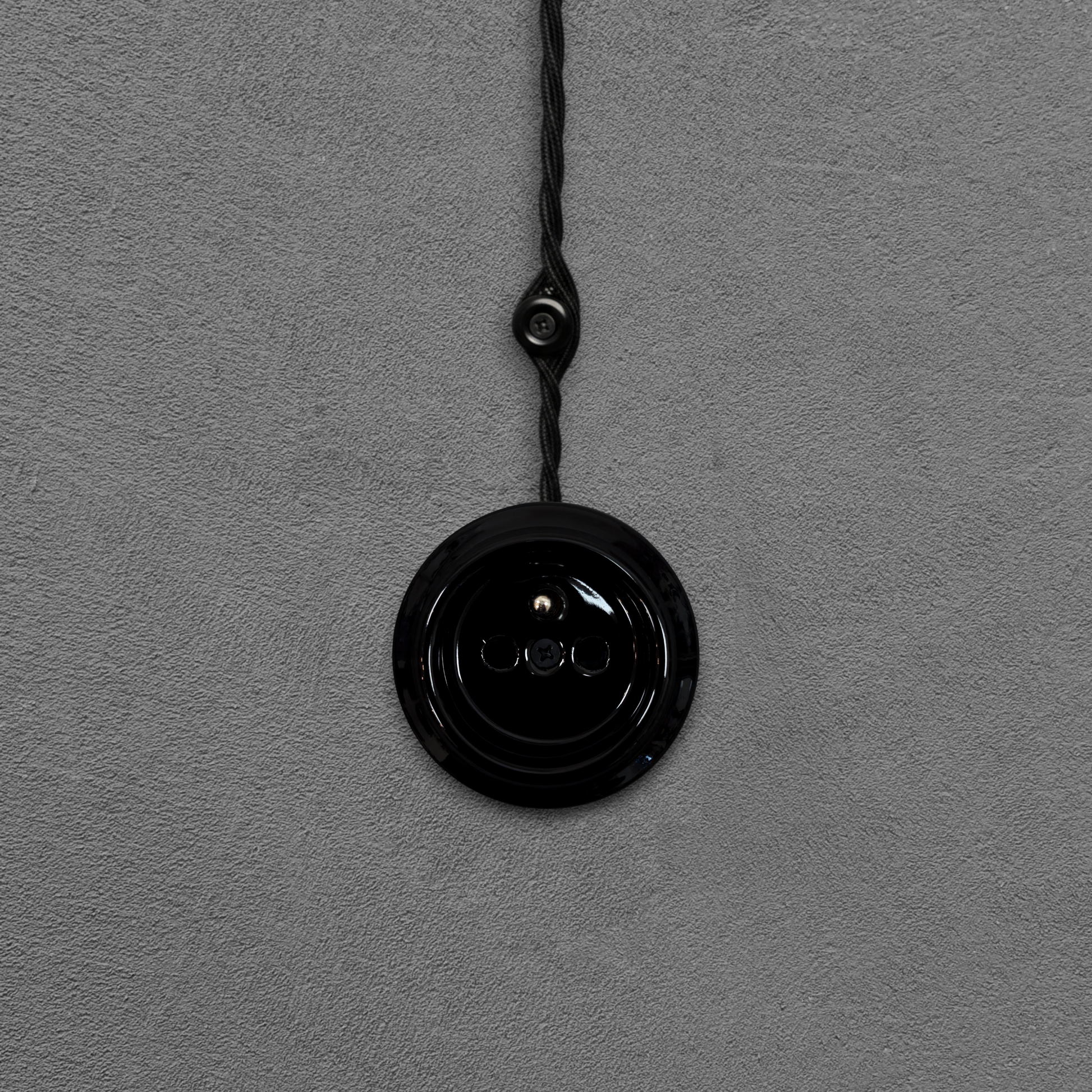 Single black French porcelain socket insert, surface-mount