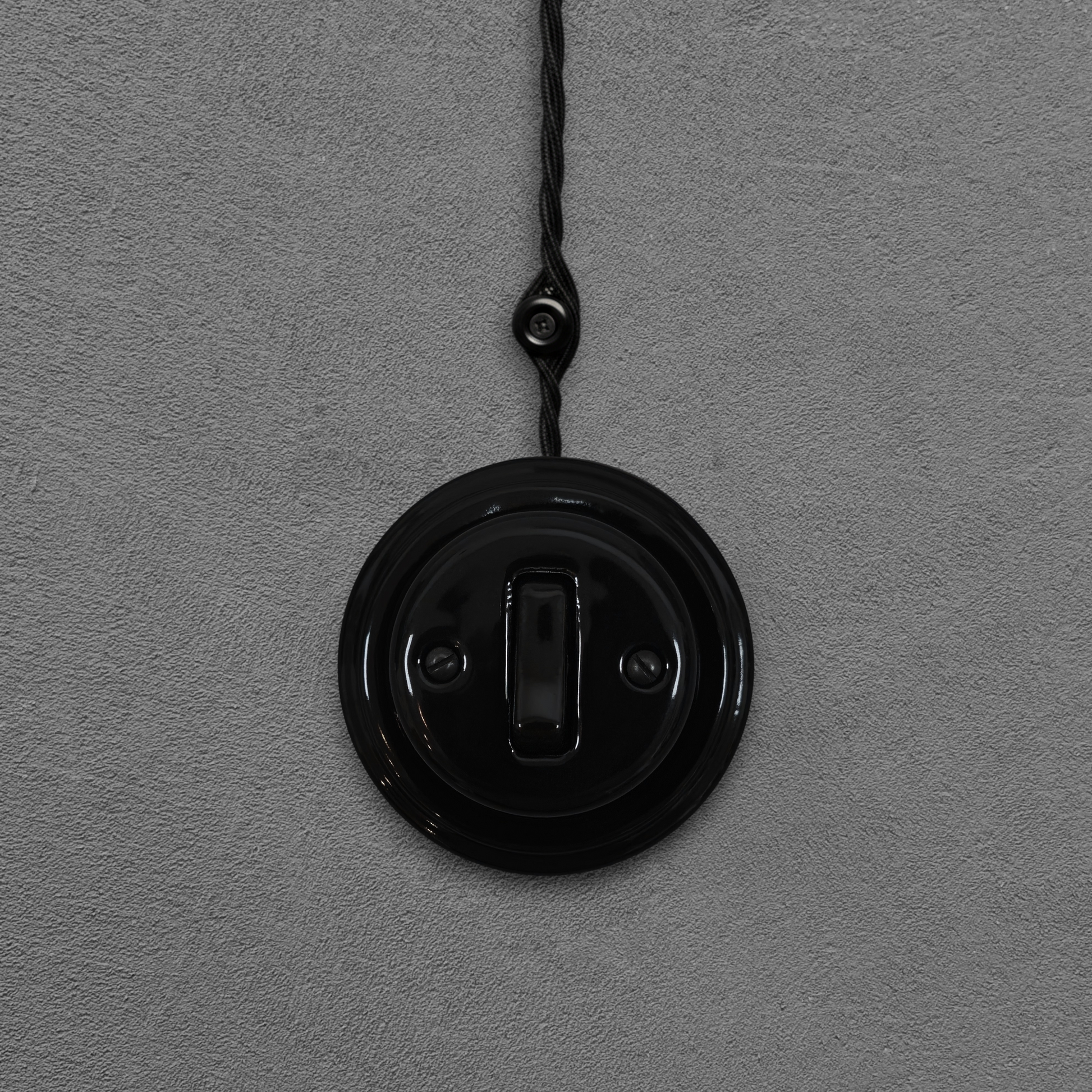 black porcelain 1gang2way light switch, surface-mount