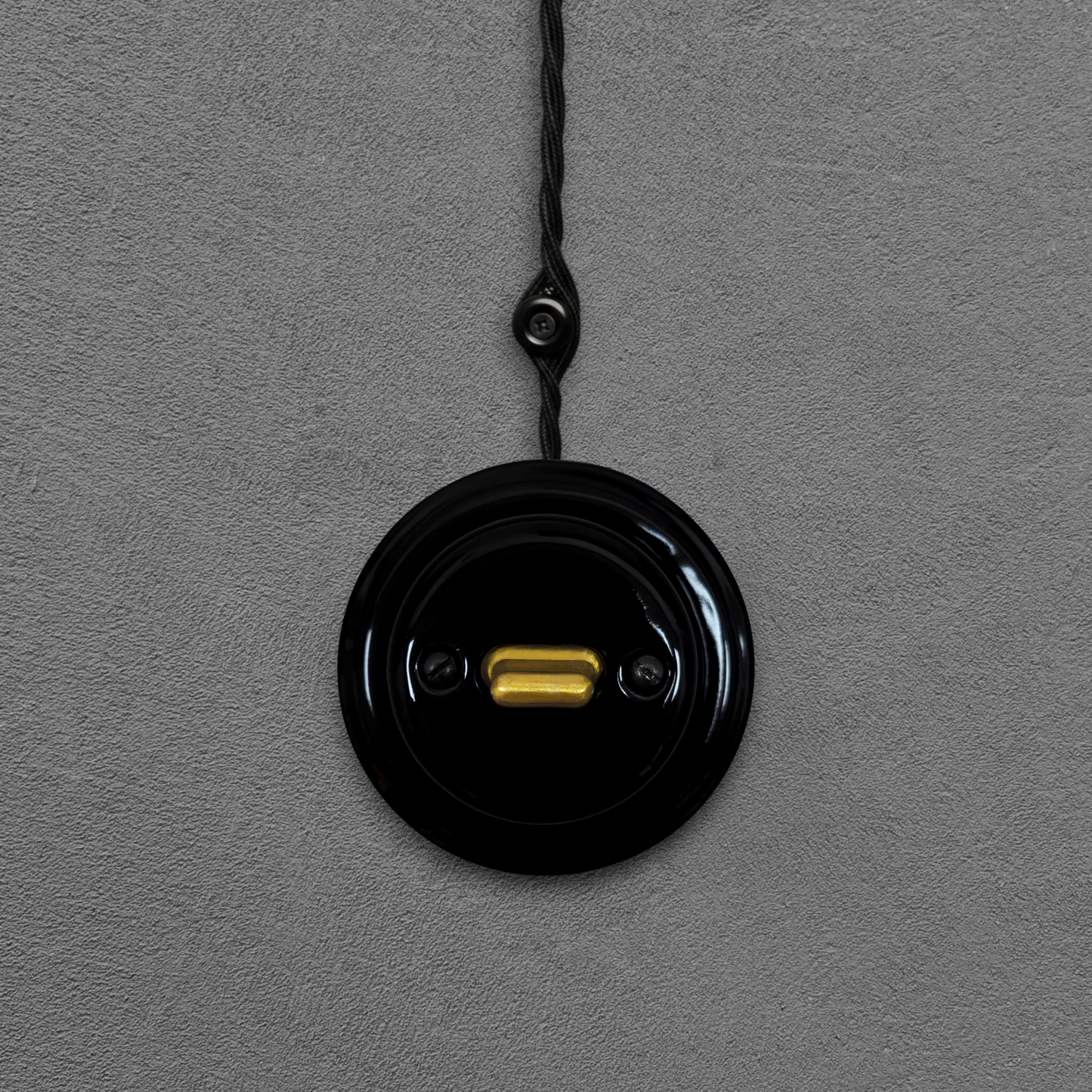 black porcelain intermediate toggle switch, surface-mount