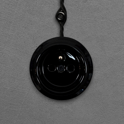 Single black French porcelain socket insert, surface-mount, front