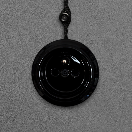 Single black French porcelain socket insert, surface-mount, front