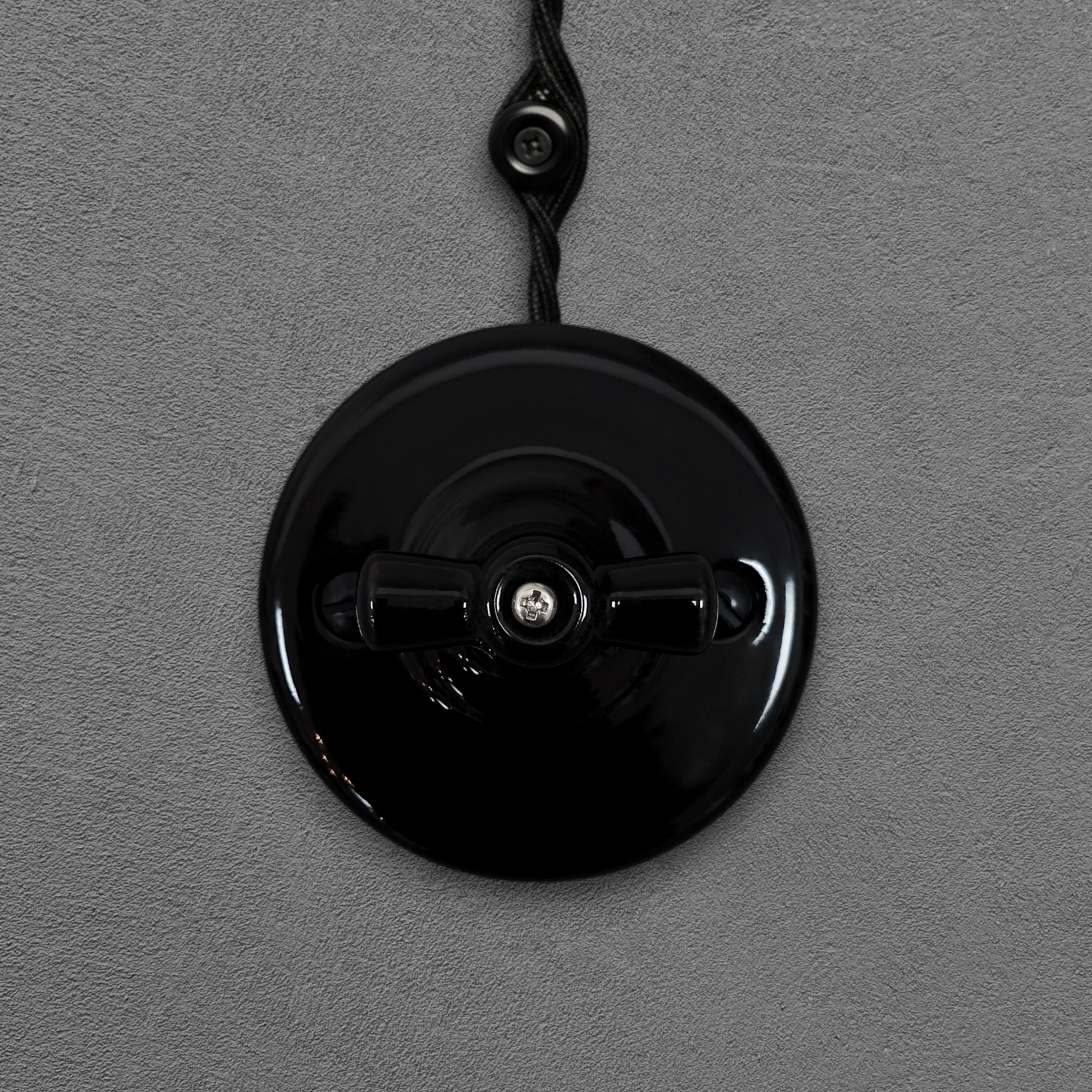 black porcelain intermediate rotary switch insert, surface-mount, front