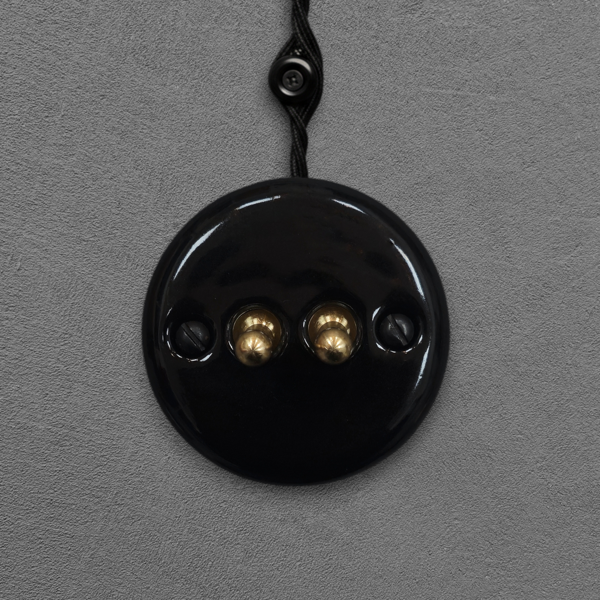 black porcelain 2gang2way toggle switch insert, surface-mount, front