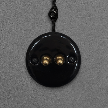 black porcelain 2gang2way toggle switch insert, surface-mount, front
