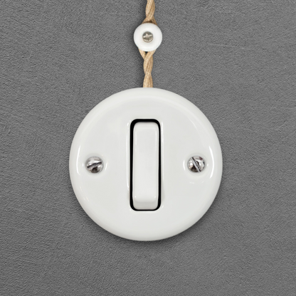 white porcelain 1gang2way light switch insert, surface-mount, front