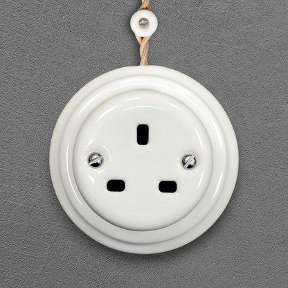 White porcelain UK Plug Socket, surface-mounted, front