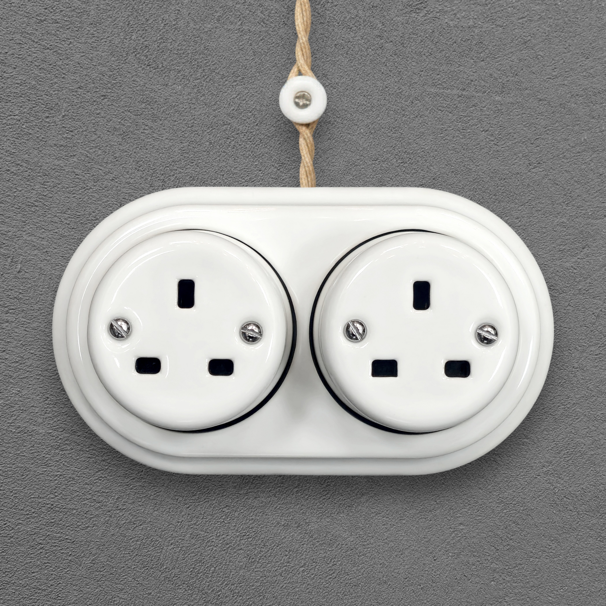 Double white porcelain UK Plug Socket, surface-mounted, front