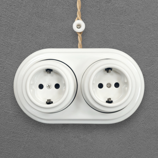 Double SCHUKO porcelain socket, white, surface-mounted, front view