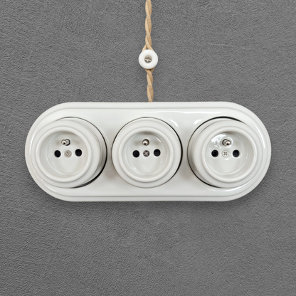 Triple white French porcelain socket, surface-mount, front