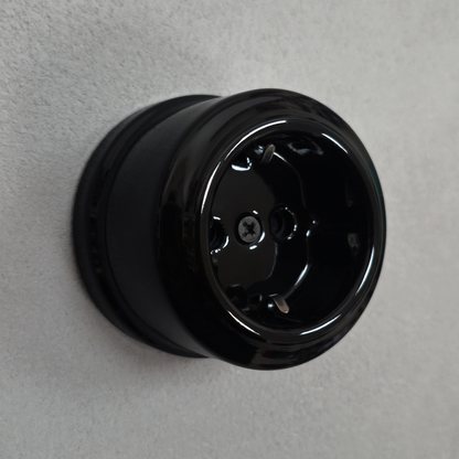 Single SCHUKO porcelain socket insert, black, surface-mounted, side view