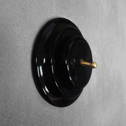 black porcelain 1gang2way toggle switch, flush-mount, angled