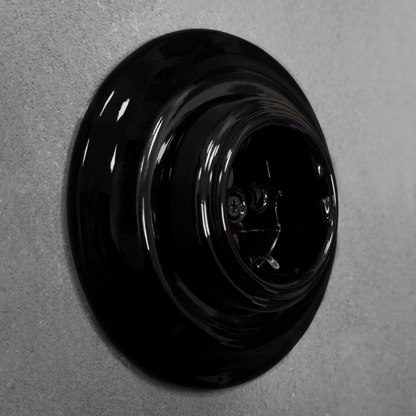 Single SCHUKO porcelain socket, black, flush-mounted, side view