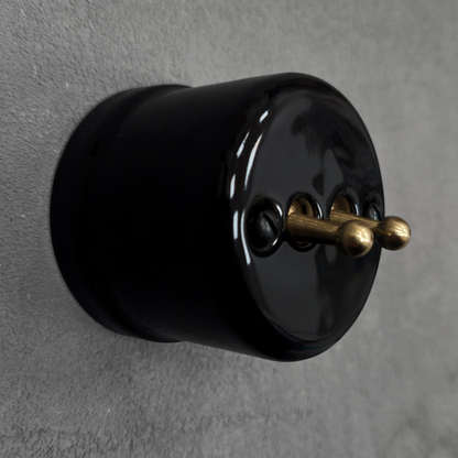black porcelain 2gang2way toggle switch insert, surface-mount, angled