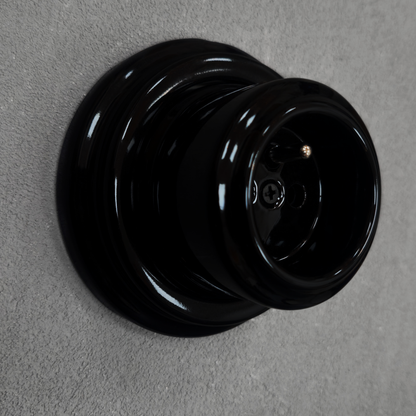 Single black French porcelain socket, surface-mount, side