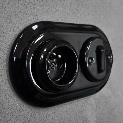 Black porcelain Type F socket with light switch, flush-mount, side