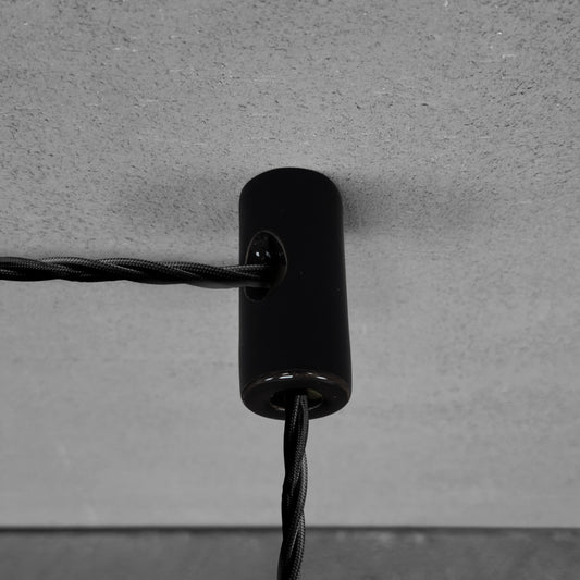 Black porcelain cable decentraliser, surface-mount, wired