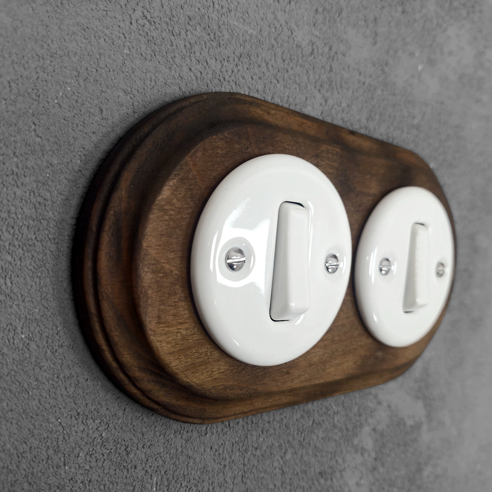 double white porcelain 1gang2way light switch dark wood frame, flush-mount, angled