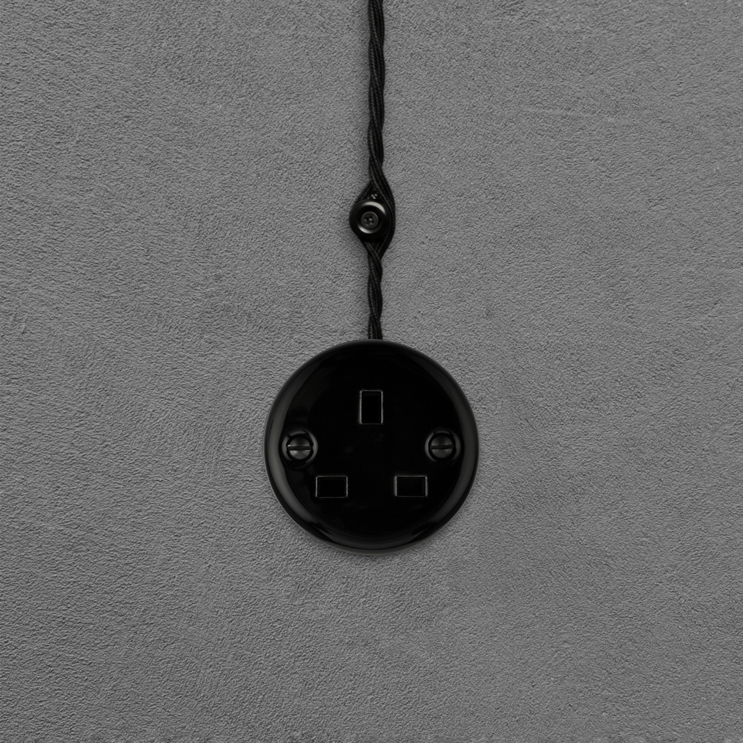 Surface Mount UK Plug Socket (Type G) – Single 3-Pin Grounded Outlet in Black Porcelain Without Frame