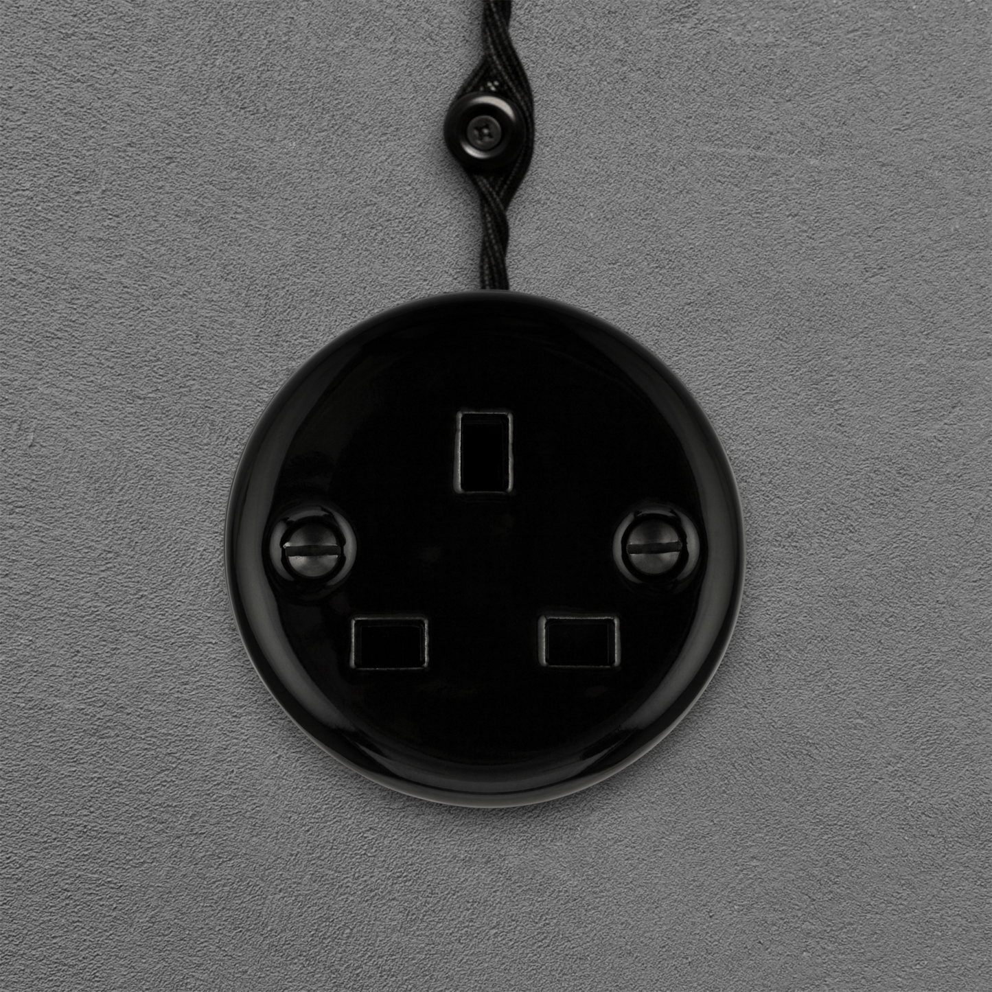 Surface Mount UK Plug Socket (Type G) – Single 3-Pin Grounded Outlet in Black Porcelain Without Frame