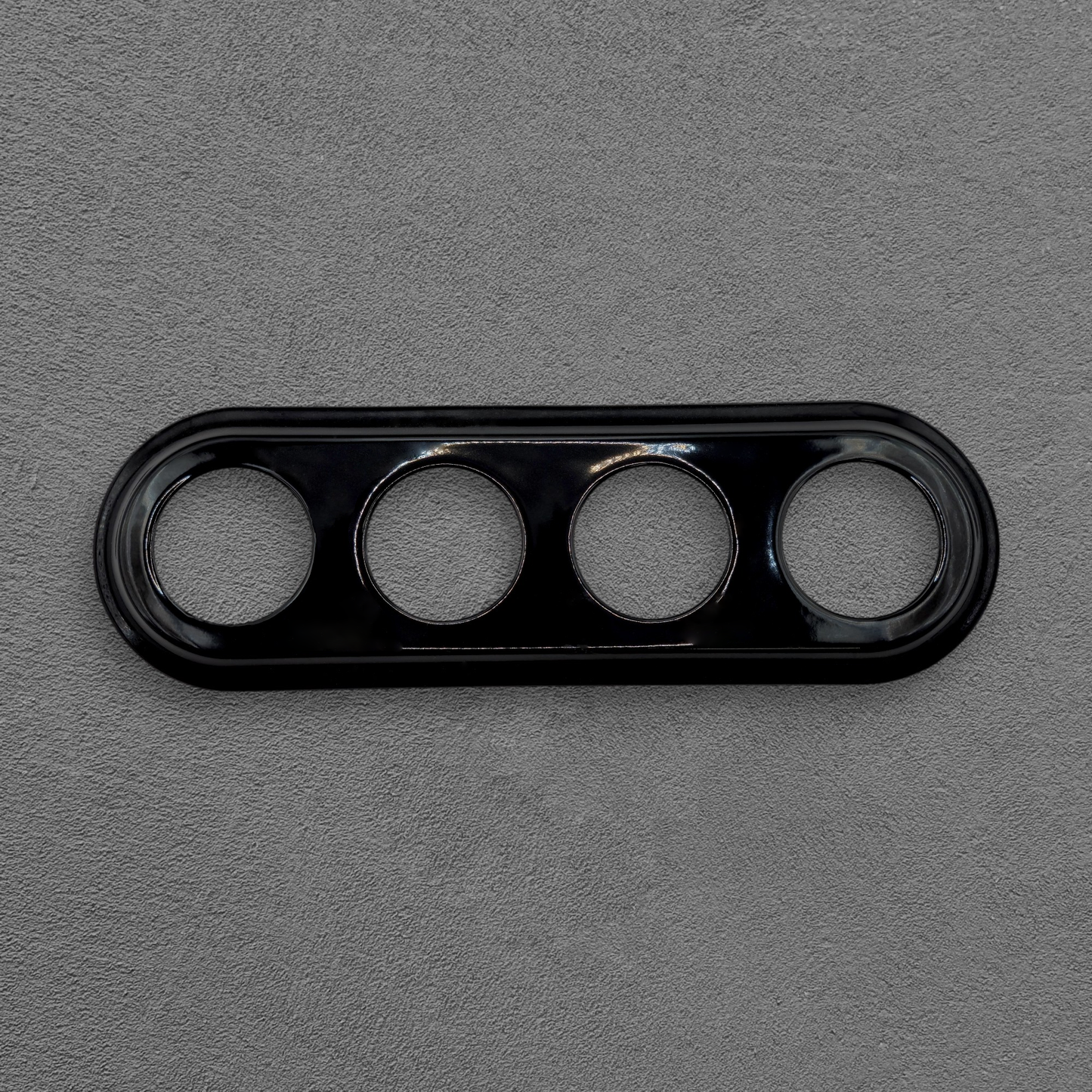 black porcelain quadruple frame, flush-mount, front