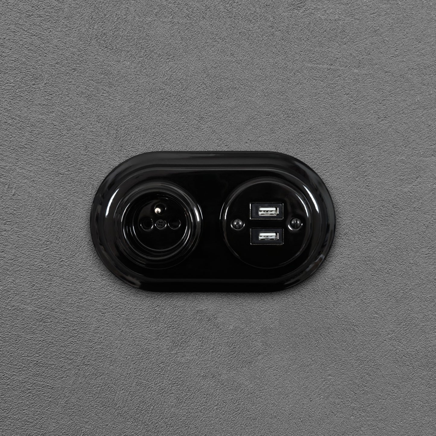 Black porcelain Type F socket with 2xUSB-A, flush-mount