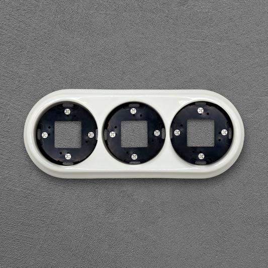Surface Mount Socket and Switch Triple Frame in White Porcelain
