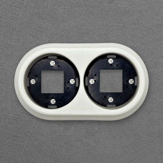 Surface Mount Socket and Switch Double Frame in White Porcelain