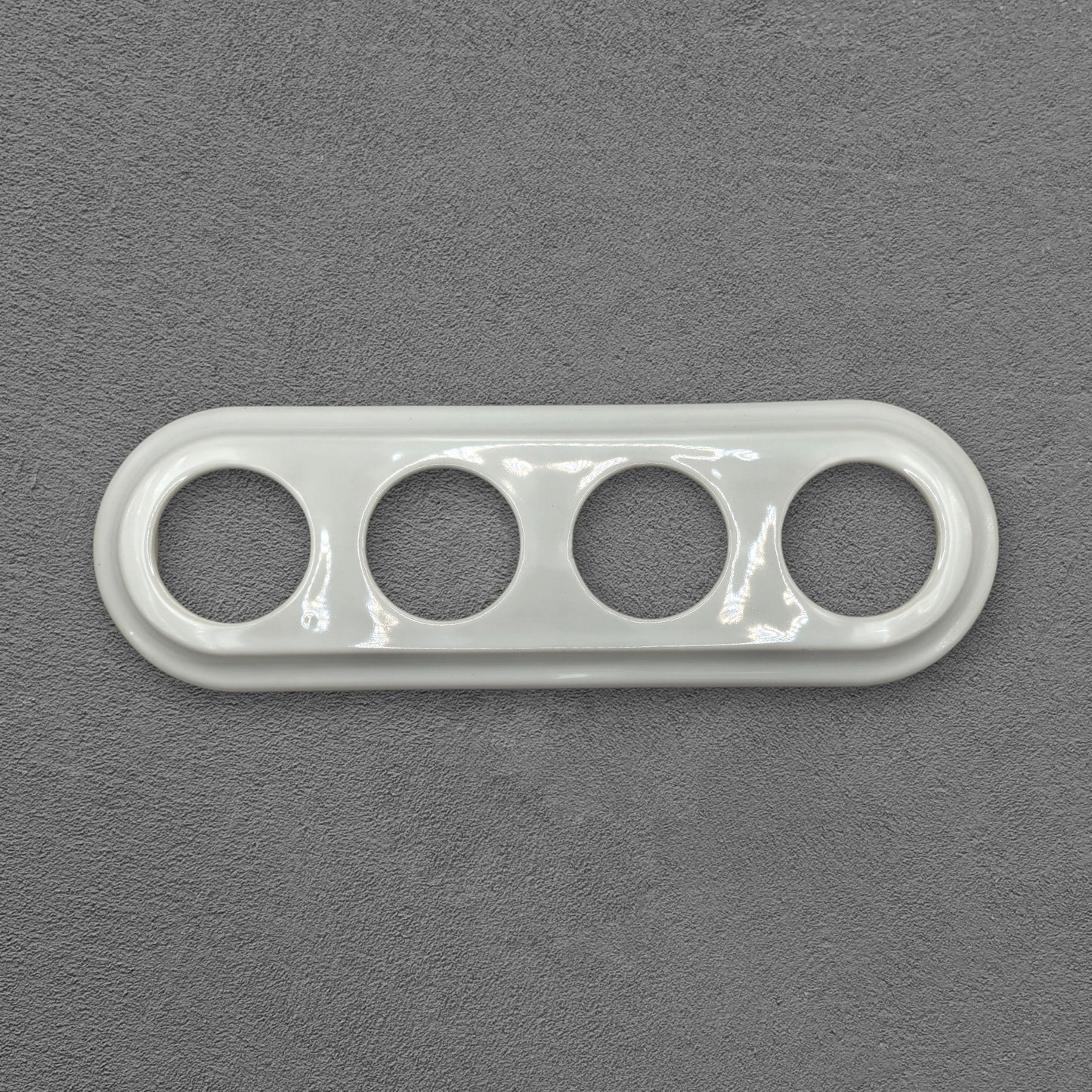 white porcelain quadruple frame, flush-mount, front