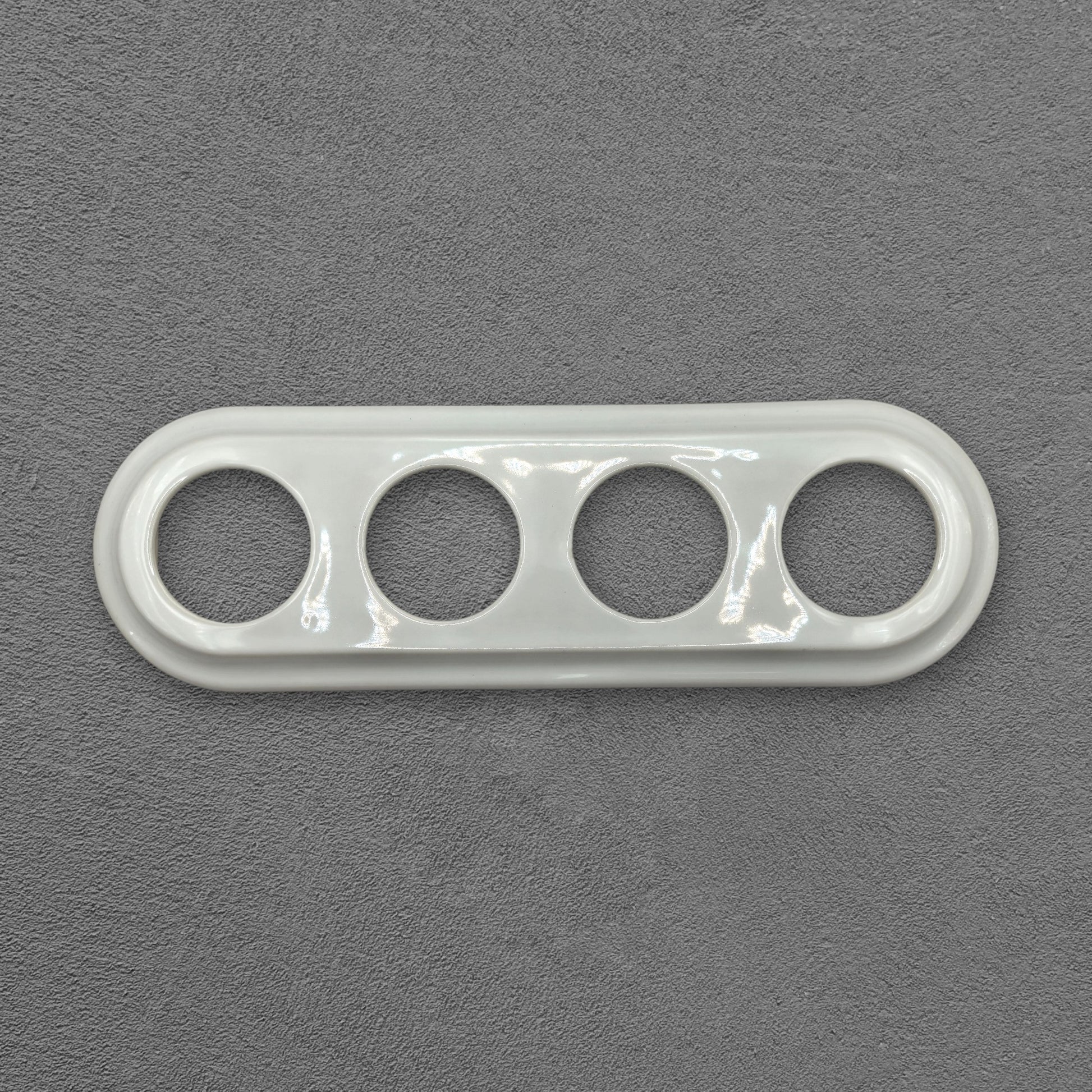 white porcelain quadruple frame, flush-mount, front