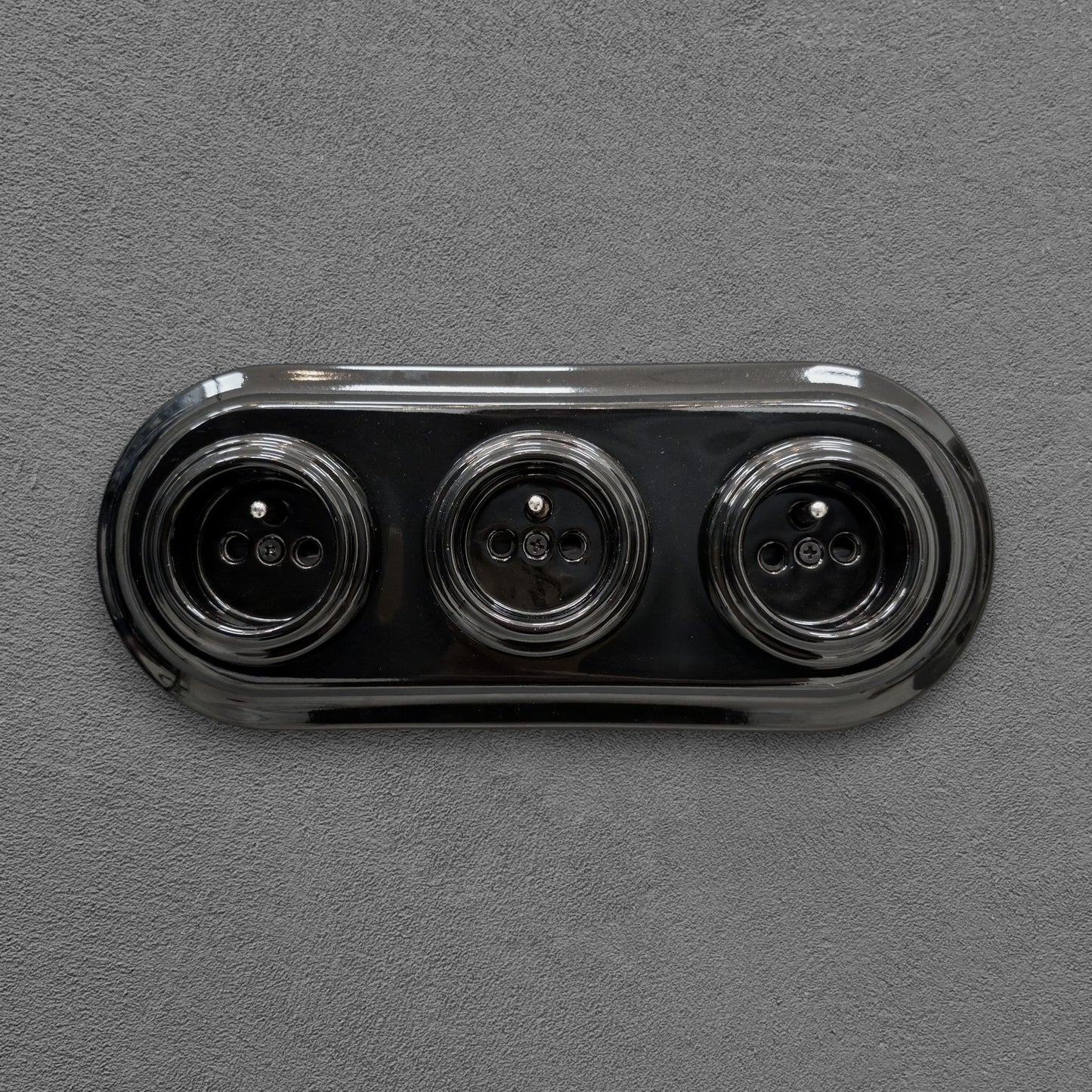 Triple black French porcelain socket, flush-mount, front