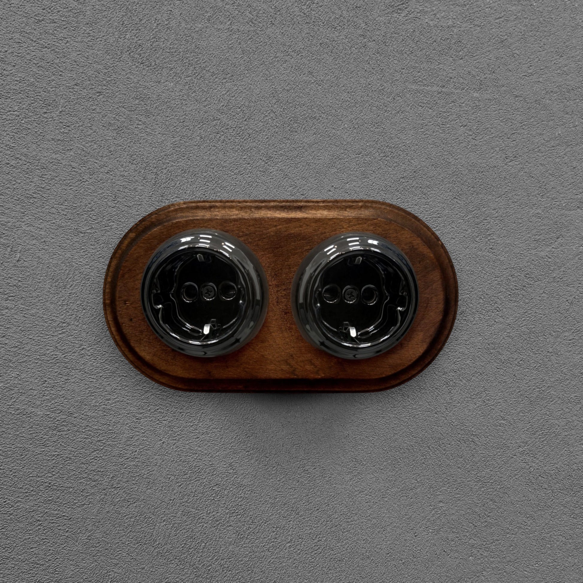 Double SCHUKO porcelain socket with dark wooden frame, black, flush-mounted