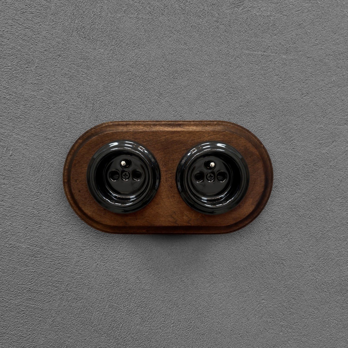 Double black French porcelain socket with dark wood frame, flush-mount