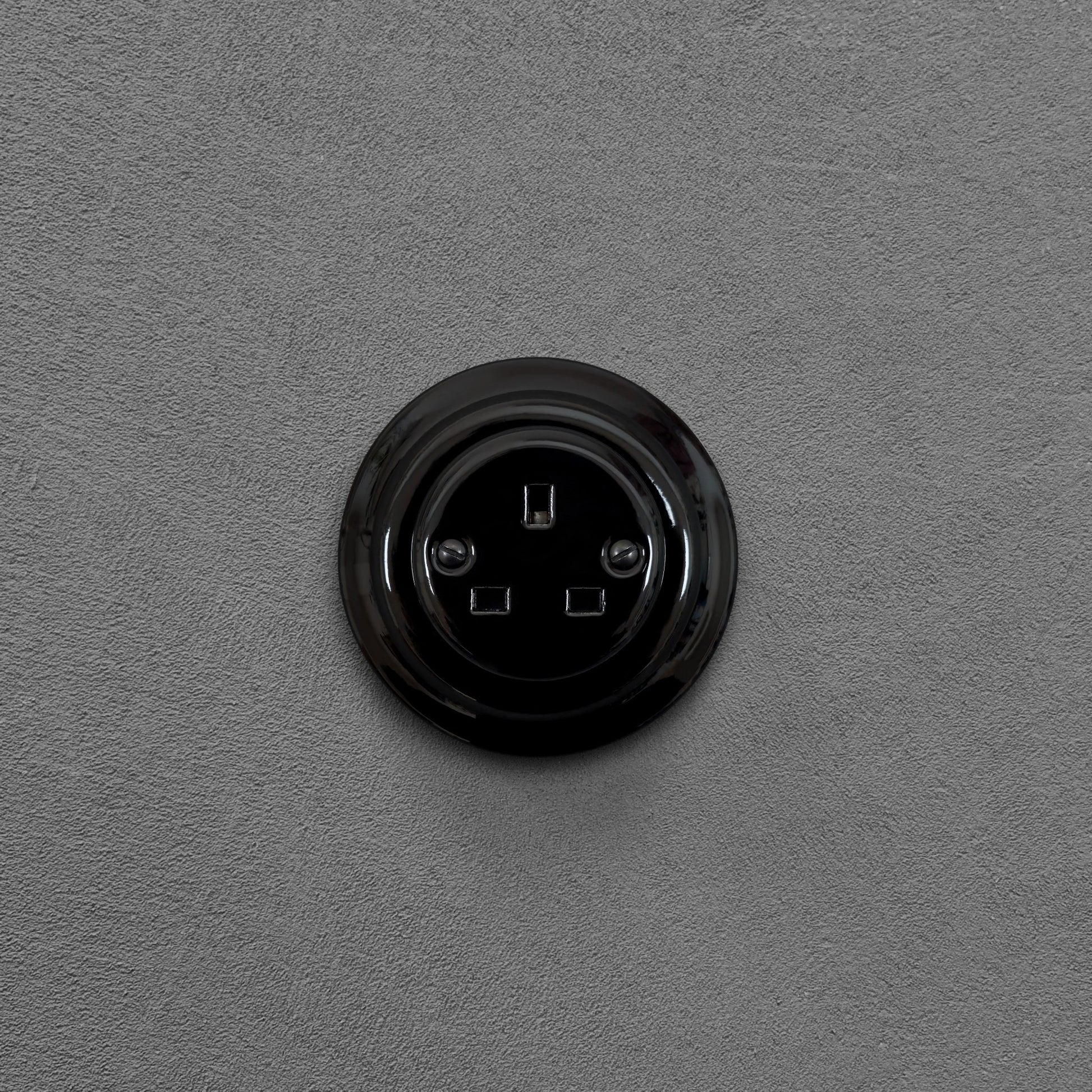 Black porcelain UK Plug Socket, flush-mounted