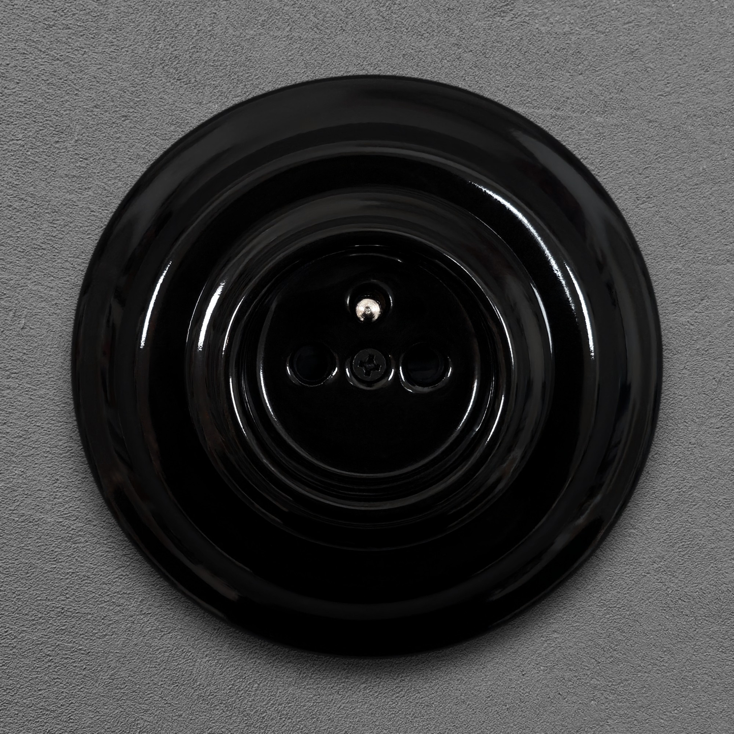 Single black French porcelain socket, flush-mount, front